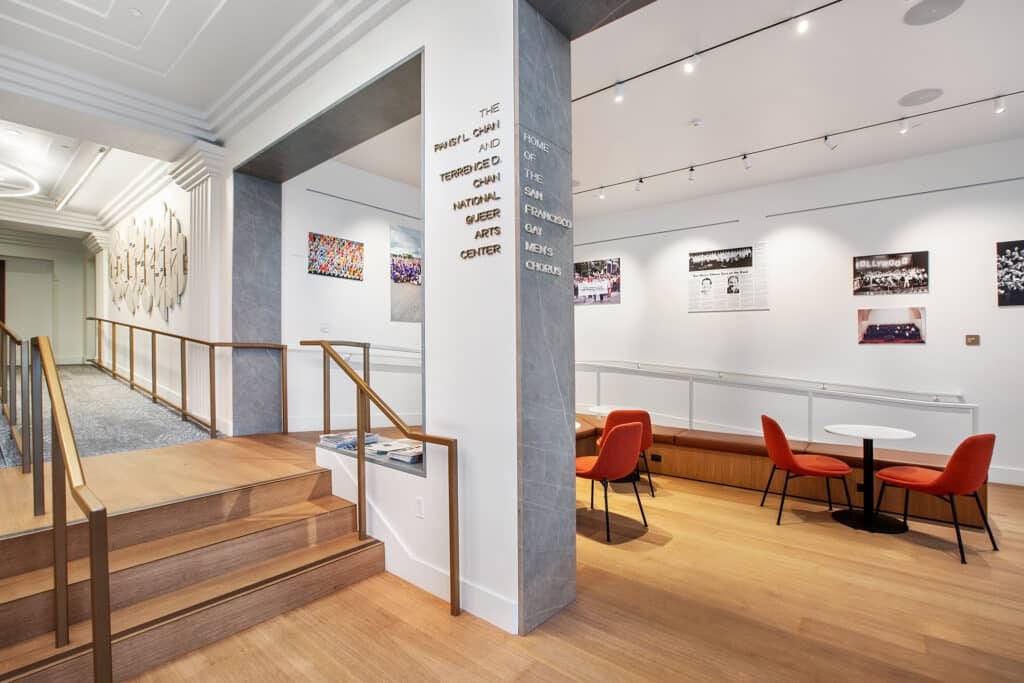 Lobby gallery with SFGMC photographs, seating and an access ramp